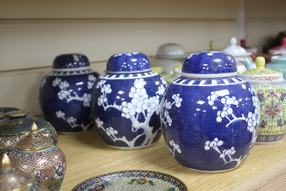 Three Chinese blue and white prunus pattern ginger jars, two other jars and ten assorted teapots